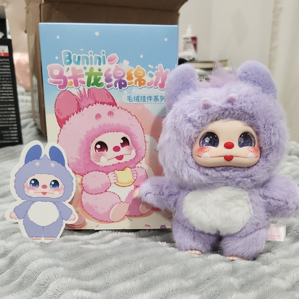Purple and White Stuffed Animal Toy